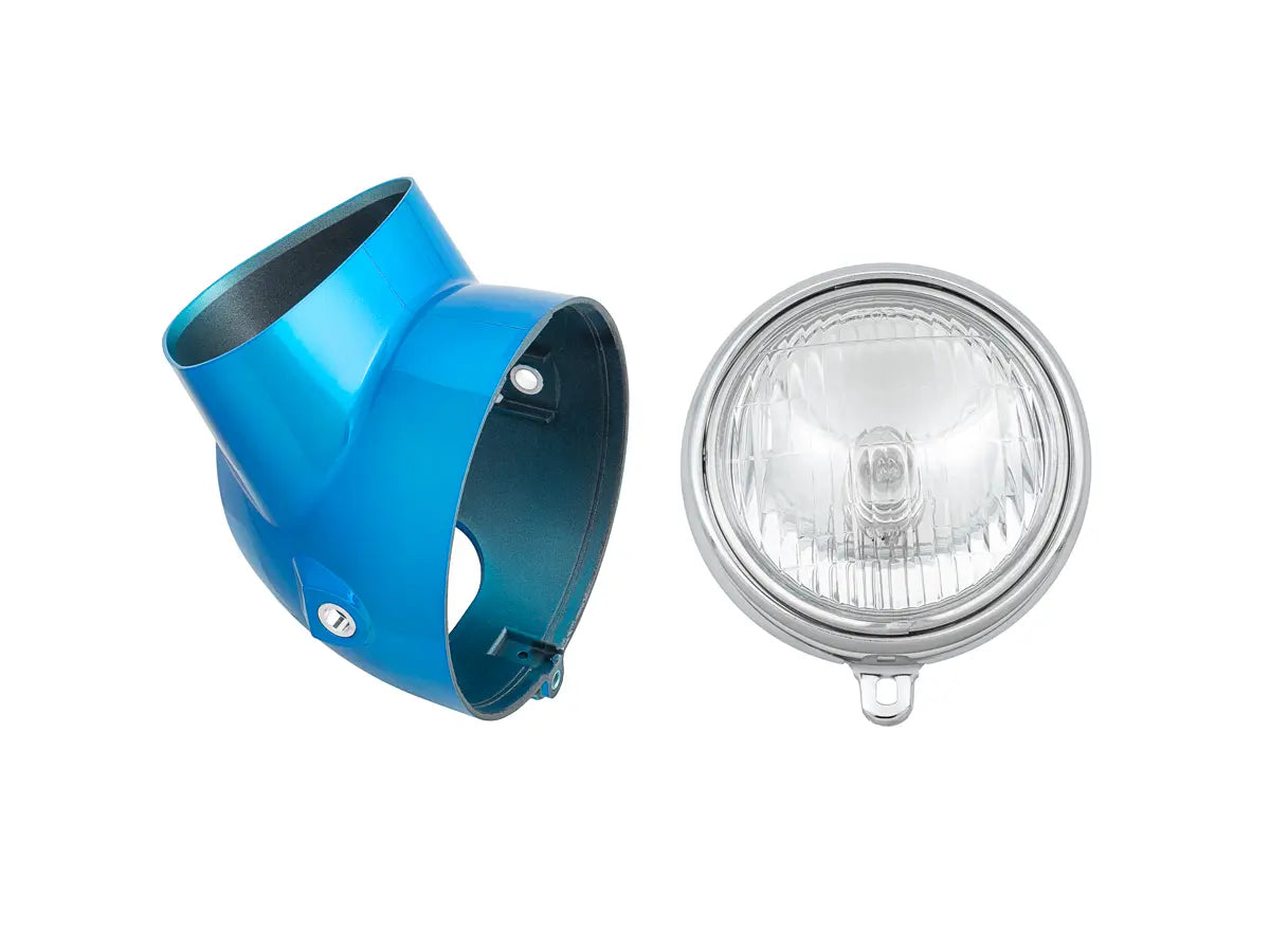 Blue metal light housing and clear glass light bulb on a white background
