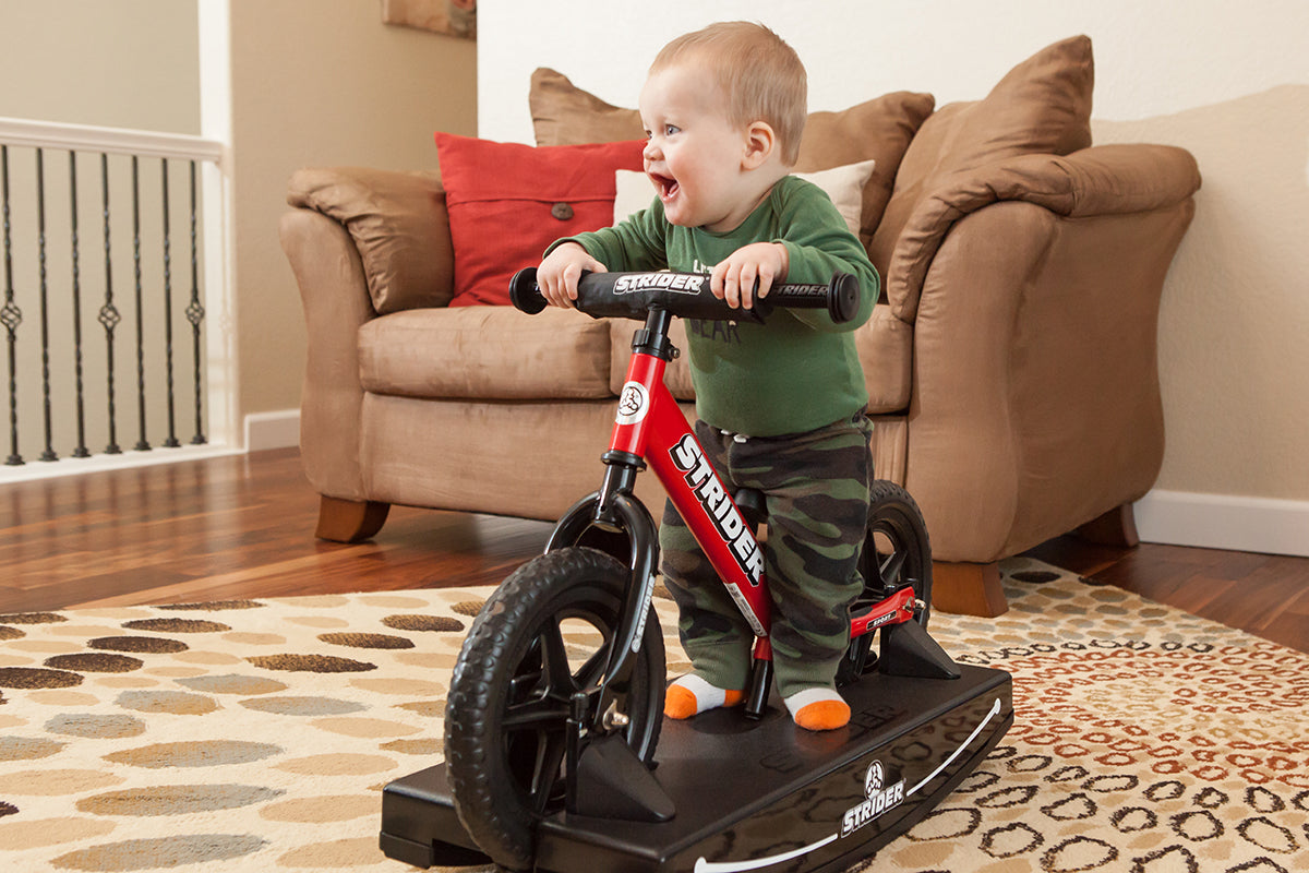 Strider balance bike online rocking base